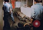 Image of bomb loading on USS Boxer Korea, 1953, second 42 stock footage video 65675038545