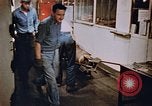 Image of bomb loading on USS Boxer Korea, 1953, second 49 stock footage video 65675038545
