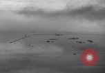 Image of sunken ships Luzon Island Philippines, 1945, second 10 stock footage video 65675038667