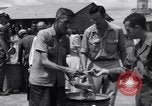 Image of rescued prisoners eating soup Luzon Island Philippines, 1945, second 35 stock footage video 65675038671