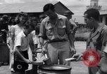 Image of rescued prisoners eating soup Luzon Island Philippines, 1945, second 38 stock footage video 65675038671