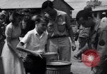 Image of rescued prisoners eating soup Luzon Island Philippines, 1945, second 41 stock footage video 65675038671