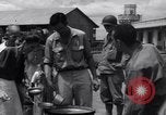 Image of rescued prisoners eating soup Luzon Island Philippines, 1945, second 48 stock footage video 65675038671
