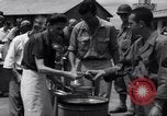 Image of rescued prisoners eating soup Luzon Island Philippines, 1945, second 50 stock footage video 65675038671
