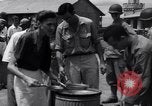 Image of rescued prisoners eating soup Luzon Island Philippines, 1945, second 51 stock footage video 65675038671