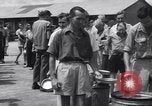 Image of rescued prisoners eating soup Luzon Island Philippines, 1945, second 60 stock footage video 65675038671
