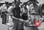 Image of rescued prisoners eating soup Luzon Island Philippines, 1945, second 62 stock footage video 65675038671
