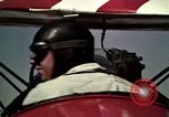 Standbild antiken Flugzeug geflogen von Gras Feld Los Angeles California USA, 1966, aus Sekunde 4 historischem Filmmaterial Videoclip 65675038706