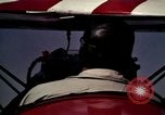 Standbild antiken Flugzeug geflogen von Gras Feld Los Angeles California USA, 1966, aus Sekunde 17 historischem Filmmaterial Videoclip 65675038706