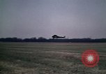 Standbild antiken Flugzeug geflogen von Gras Feld Los Angeles California USA, 1966, aus Sekunde 25 historischem Filmmaterial Videoclip 65675038706