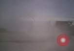 Standbild antiken Flugzeug geflogen von Gras Feld Los Angeles California USA, 1966, aus Sekunde 31 historischem Filmmaterial Videoclip 65675038706