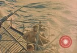 Image of Rescued sailors Okinawa Ryukyu Islands, 1945, second 18 stock footage video 65675038713