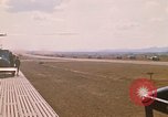 Image of long line of UH-1 Helicopters Pleiku Vietnam, 1970, second 9 stock footage video 65675038743