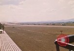 Image of long line of UH-1 Helicopters Pleiku Vietnam, 1970, second 10 stock footage video 65675038743