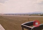 Image of long line of UH-1 Helicopters Pleiku Vietnam, 1970, second 11 stock footage video 65675038743