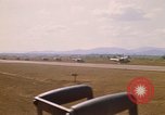 Image of long line of UH-1 Helicopters Pleiku Vietnam, 1970, second 12 stock footage video 65675038743