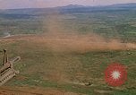 Image of long line of UH-1 Helicopters Pleiku Vietnam, 1970, second 23 stock footage video 65675038743