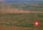 Image of long line of UH-1 Helicopters Pleiku Vietnam, 1970, second 26 stock footage video 65675038743