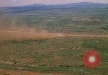 Image of long line of UH-1 Helicopters Pleiku Vietnam, 1970, second 27 stock footage video 65675038743