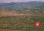 Image of long line of UH-1 Helicopters Pleiku Vietnam, 1970, second 28 stock footage video 65675038743