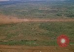 Image of long line of UH-1 Helicopters Pleiku Vietnam, 1970, second 29 stock footage video 65675038743
