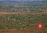 Image of long line of UH-1 Helicopters Pleiku Vietnam, 1970, second 31 stock footage video 65675038743