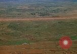 Image of long line of UH-1 Helicopters Pleiku Vietnam, 1970, second 32 stock footage video 65675038743