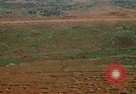 Image of long line of UH-1 Helicopters Pleiku Vietnam, 1970, second 33 stock footage video 65675038743
