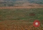 Image of long line of UH-1 Helicopters Pleiku Vietnam, 1970, second 34 stock footage video 65675038743