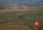 Image of long line of UH-1 Helicopters Pleiku Vietnam, 1970, second 36 stock footage video 65675038743