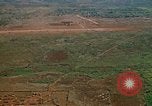Image of long line of UH-1 Helicopters Pleiku Vietnam, 1970, second 37 stock footage video 65675038743