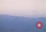 Image of long line of UH-1 Helicopters Pleiku Vietnam, 1970, second 38 stock footage video 65675038743