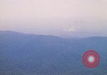 Image of long line of UH-1 Helicopters Pleiku Vietnam, 1970, second 39 stock footage video 65675038743