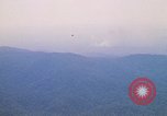 Image of long line of UH-1 Helicopters Pleiku Vietnam, 1970, second 41 stock footage video 65675038743