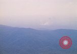 Image of long line of UH-1 Helicopters Pleiku Vietnam, 1970, second 42 stock footage video 65675038743