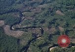 Image of long line of UH-1 Helicopters Pleiku Vietnam, 1970, second 50 stock footage video 65675038743
