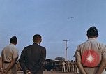 Image of flag raising ceremony Udorn Royal Thai Air Force Base Thailand, 1966, second 48 stock footage video 65675038782