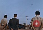 Image of flag raising ceremony Udorn Royal Thai Air Force Base Thailand, 1966, second 49 stock footage video 65675038782