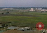 Standbild Flugzeuge landen Thailand, 1967, aus Sekunde 10 historischem Filmmaterial Videoclip 65675038787