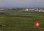 Standbild Flugzeuge landen Thailand, 1967, aus Sekunde 14 historischem Filmmaterial Videoclip 65675038787
