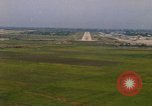Standbild Flugzeuge landen Thailand, 1967, aus Sekunde 16 historischem Filmmaterial Videoclip 65675038787