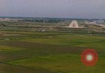 Standbild Flugzeuge landen Thailand, 1967, aus Sekunde 31 historischem Filmmaterial Videoclip 65675038787