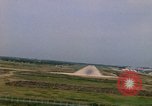 Standbild Flugzeuge landen Thailand, 1967, aus Sekunde 51 historischem Filmmaterial Videoclip 65675038787