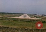 Standbild Flugzeuge landen Thailand, 1967, aus Sekunde 57 historischem Filmmaterial Videoclip 65675038787