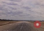 Standbild Luftfahrzeug landet Ubon Ratchathani Thailand, 1967, aus Sekunde 23 historischem Filmmaterial Videoclip 65675038792