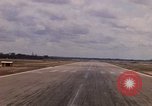 Standbild Luftfahrzeug landet Ubon Ratchathani Thailand, 1967, aus Sekunde 27 historischem Filmmaterial Videoclip 65675038792