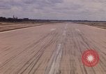 Standbild Luftfahrzeug landet Ubon Ratchathani Thailand, 1967, aus Sekunde 36 historischem Filmmaterial Videoclip 65675038792