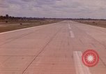 Standbild Luftfahrzeug landet Ubon Ratchathani Thailand, 1967, aus Sekunde 53 historischem Filmmaterial Videoclip 65675038792