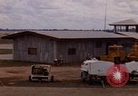 Standbild Luftfahrzeug landet Ubon Ratchathani Thailand, 1967, aus Sekunde 61 historischem Filmmaterial Videoclip 65675038792