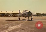 Image of Laotian trainer aircraft T-28D Udorn Royal Thai Air Force Base Thailand, 1972, second 1 stock footage video 65675038807